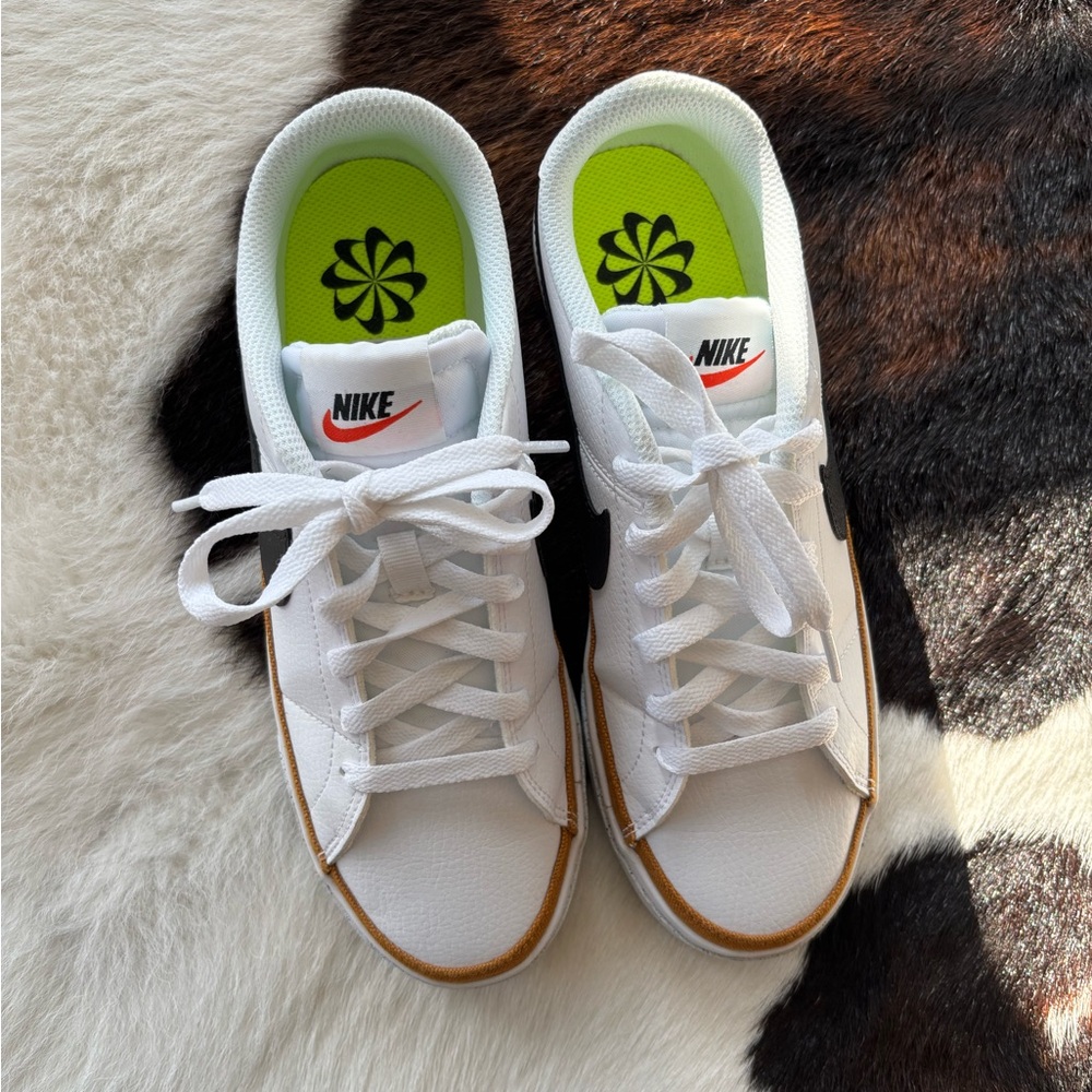 Nike White Sneakers with Black Swoosh